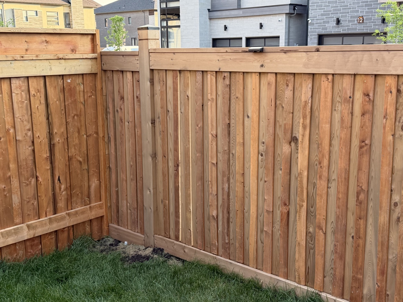 Grandvision pressure-treated wood privacy fence at a GTA home